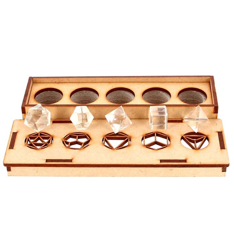 Platonska kroppar i bergskristall med trälåda